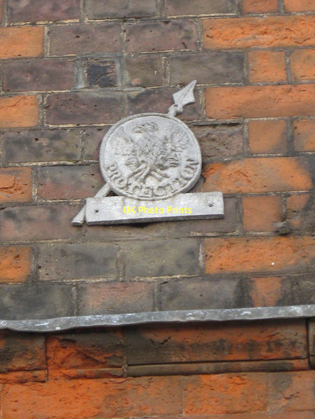 Photo 6"x4" A Phoenix fire protection plate, Fournier Street, Spitalfields London c2011