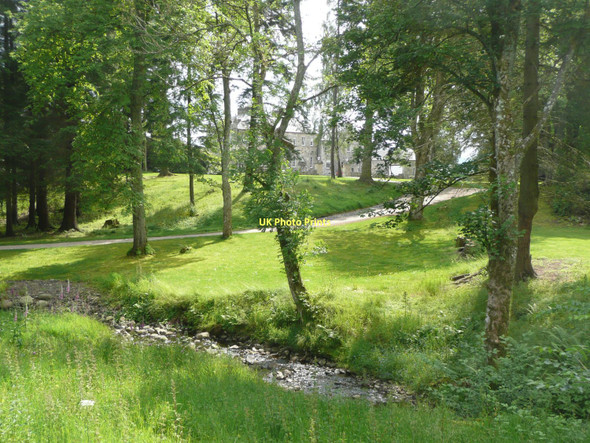 Photo 6"x4" Cluny Castle through the trees Balgowan\/NN6394 c2011