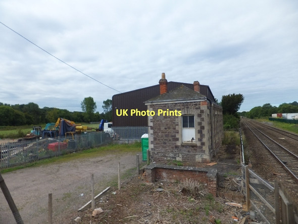 Photo 6"x4" Former railway station and platform Hele\/SS9902 c2011