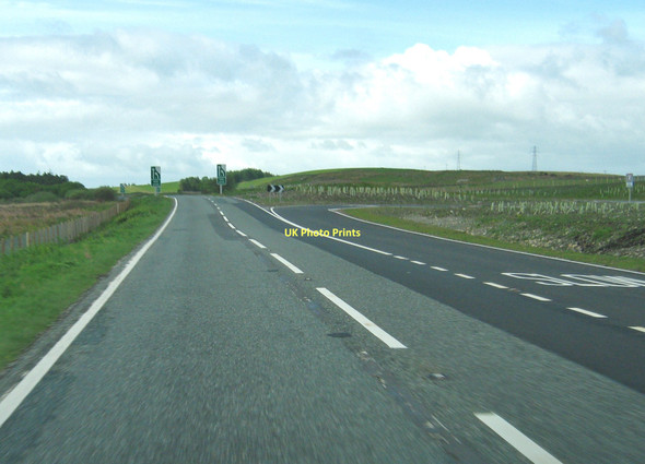 Photo 6"x4" A right turning from the dual carriageway on the A75 Barhapple Loch c2011