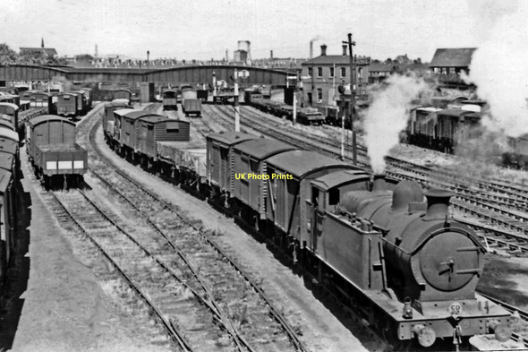 Photo 6"x4" Goods train for Roath Docks on Cardiff & Rhymney line, with 0-6-0T Cardiff\/Caerdydd c1950