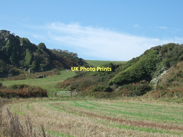 Photo 6"x4" Raised beach with cliffs behind and cave on right East Prawle c2011