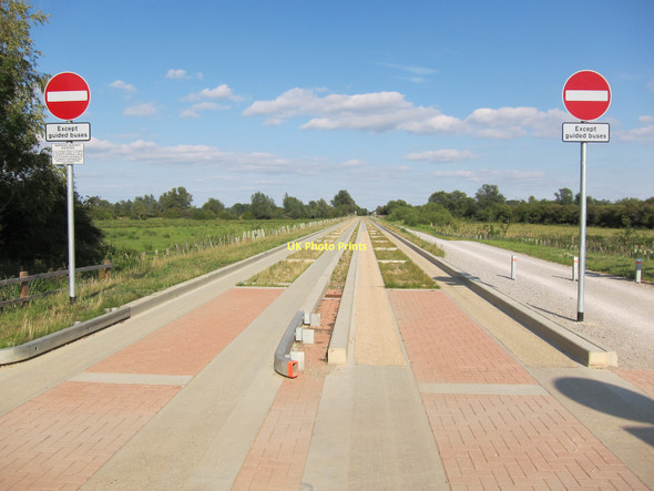 Photo 6"x4" Guided Busway leaving Fen Drayton Lakes Church End\/TL3669 c2011