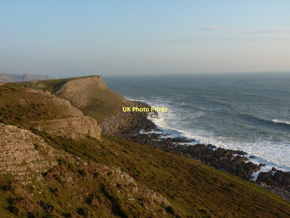 Photo 6"x4" A moderate swell on the rocks near Worms Head Rhossili c2011