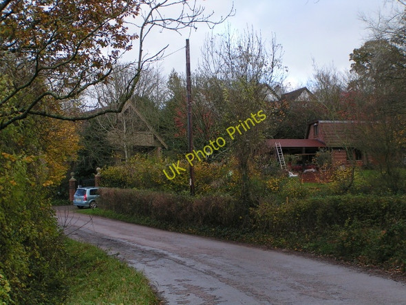 Photo 6"x4" Houses near Poundapit Copse Hele\/SS9902 c2009