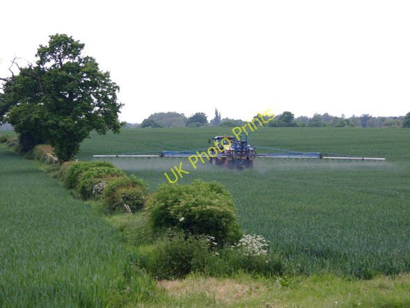 Photo 6"x4" Crop spraying on Chesterton Fields Farm Chesterton Green c2010