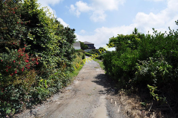 Photo 6"x4" The footpath to Mortehoe Station Road passes along a track in front of Seymour Villas Higher Warcombe c2010