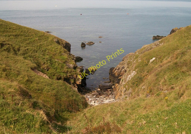 Photo 6"x4" Indentation in the cliffs on the south side of Porth Gwylan Tudweiliog c2010