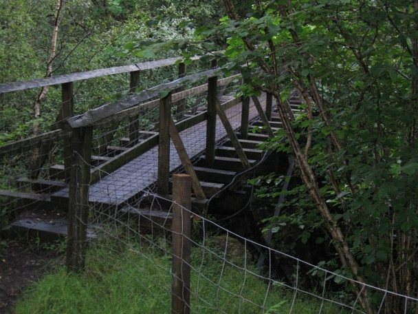 Photo 6"x4" Footbridge using remains of old narrow-gauge railway bridge over Allt a'Mhuilinn Torlundy c2008