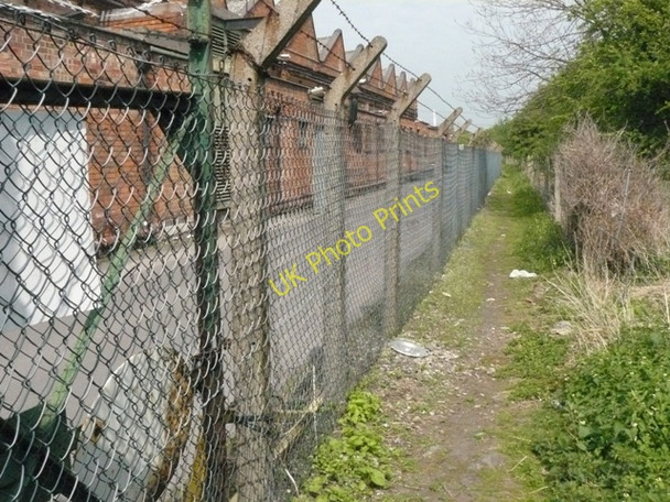Photo 6"x4" Loughborough path by factory and railway Loughborough c2009