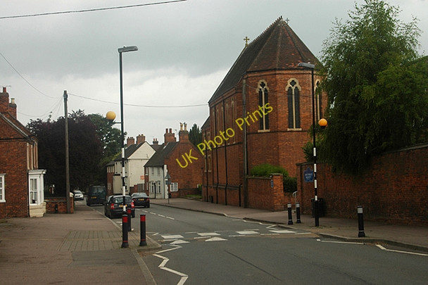 Photo 6"x4" Main Street Abbots Bromley beneath gathering rain clouds Abbots Bromley c2009