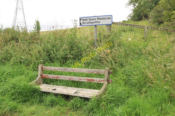 Photo 6"x4" Ruined bench and sign for the Neil Gunn Memorial Dingwall\/NH5458 c2010