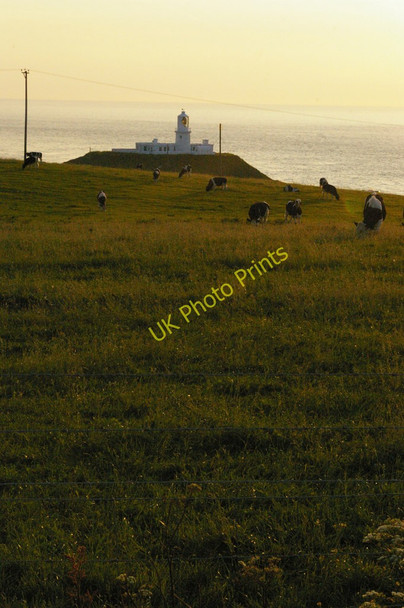 Photo 6"x4" Strumble Head lighthouse, sunset Trefasser c2009