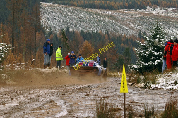 Photo 6"x4" Rally car crossing forestry road junctions in Ae Ae c2006