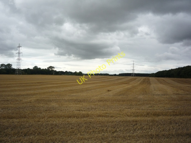 Photo 6"x4" Pylons over a field of stubble Fawdington c2010