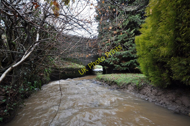 Photo 6"x4" A bridge which carries the B3230 over a stream near Blakewell as seen from upstream Barnstaple c2011
