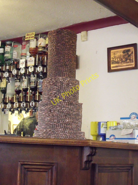 Photo 6"x4" A pile of two penny bits on the bar at the Maypole, Yapton Barnham\/SU9604 c2010