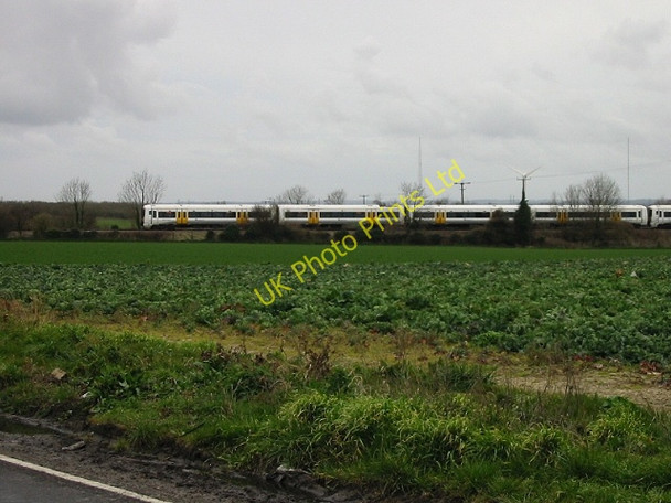 Photo 6"x4" Ramsgate bound train approaching the Sevenscore level crossing Cliffs End c2008