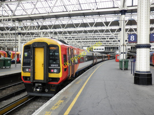 Photo 6"x4" Exeter train stands at platform 8, Waterloo Station London c2011