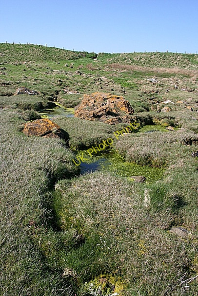 Photo 6"x4" Saltmarsh with boulders Whitehills\/NJ6565 c2008