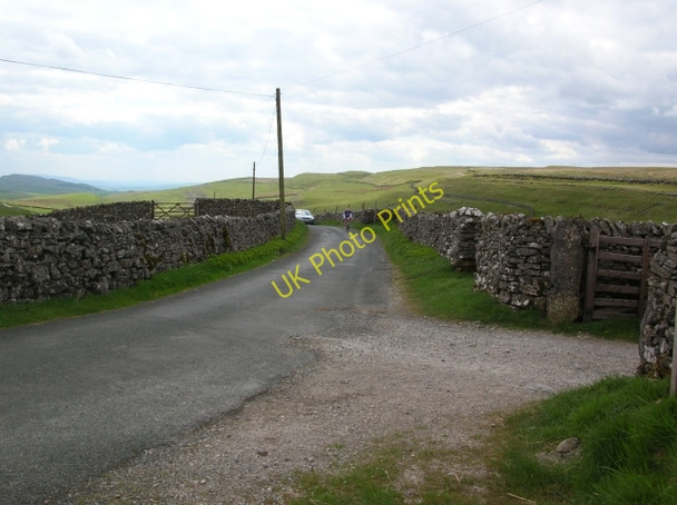 Photo 6"x4" Cyclist approaches cattle grid Brackenbottom c2008