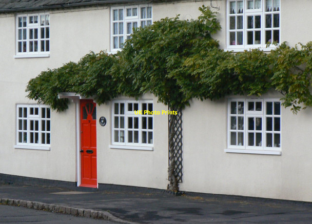 Photo 6"x4" The red door Walton on the Wolds c2011