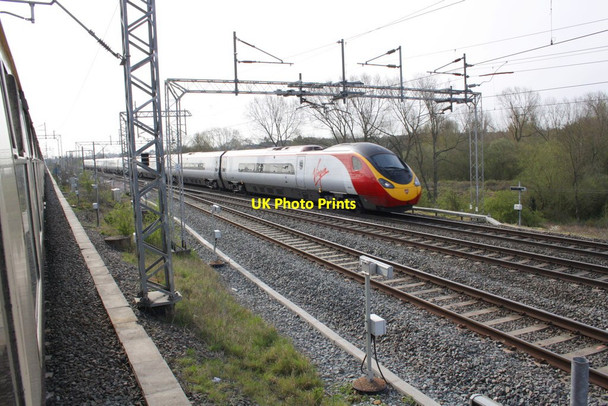 Photo 6"x4" Virgin Pendolino speeds towards Rugby Station Rugby c2012