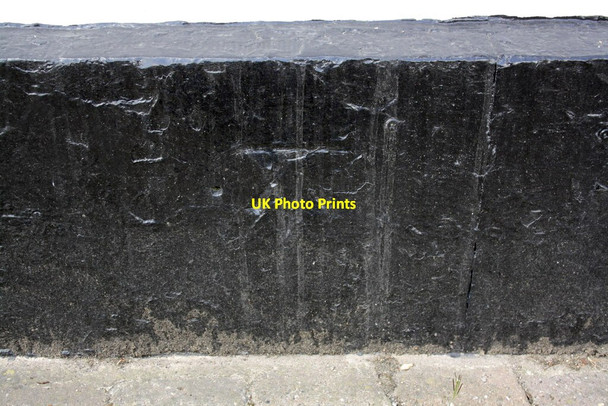 Photo 6"x4" Benchmark on black skirt of #24 St Mary's Gate Ripon c2013