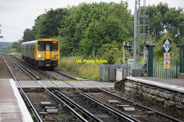 Photo 6"x4" Train approaching Maghull station Maghull c2013