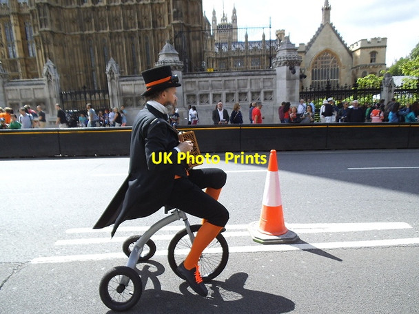 Photo 6"x4" Eccentric cyclist in Parliament Square Westminster c2013