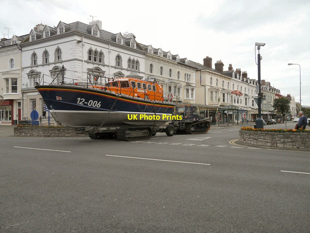Photo 6"x4" Andy Pearce crossing Mostyn Street Llandudno c2014