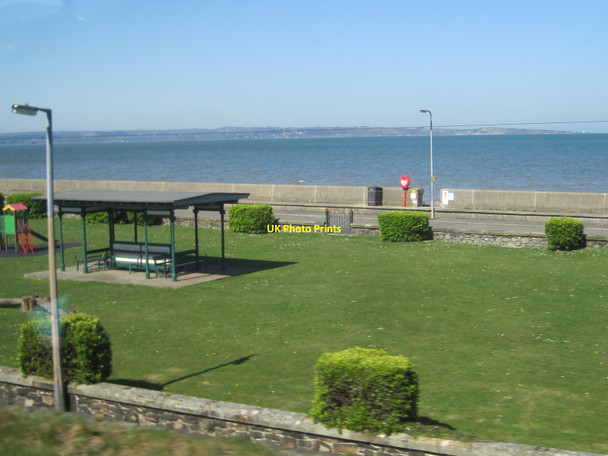 Photo 6"x4" From a Chester-Holyhead train - Small park at Llanfairfechan Llanfairfechan c2015