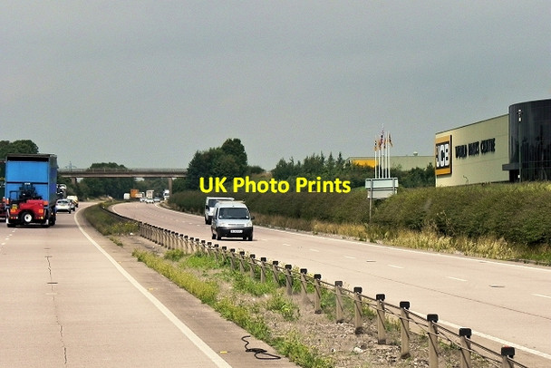 Photo 6"x4" A50 Passing JCB World Parts Centre Beamhurst Lane c2014