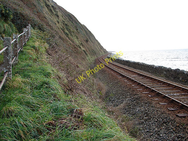 Photo 6"x4" Cambrian Coast railway line beneath Harlech Cliff Llanfair\/SH5729 c2008