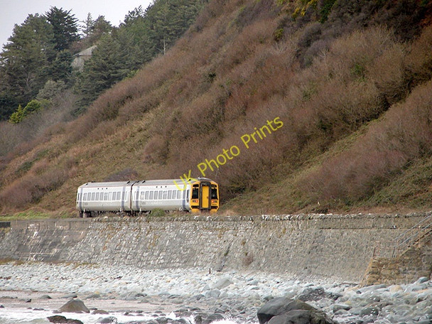Photo 6"x4" A train from Birmingham approaching Harlech Llanfair\/SH5729 c2008