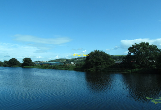 Photo 6"x4" View north across the Newry Canal towards Barretts Steel Stockists on the Greenbank Industrial Estate Newry c2012