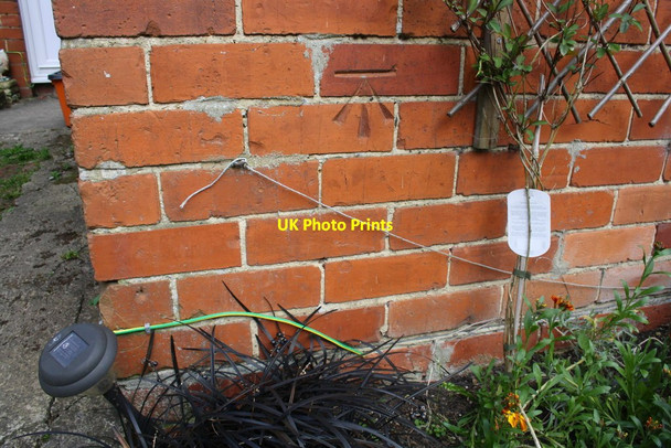 Photo 6"x4" Benchmark on #1 Lotmead Cottages Covingham c2015