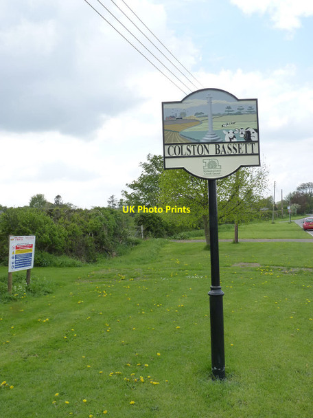 Photo 6"x4" Colston Bassett village entrance sign Colston Bassett c2014