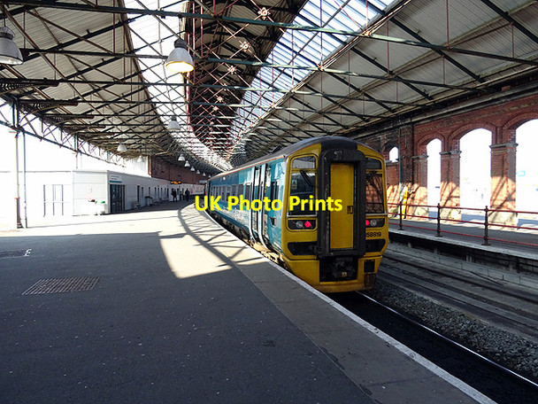 Photo 6"x4" An Arriva Wales train stands in Holyhead station Holyhead\/Caergybi c2016
