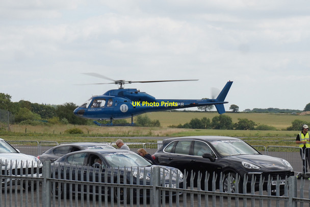 Photo 6"x4" Helicopter takes off at Silverstone Cattle End c2015
