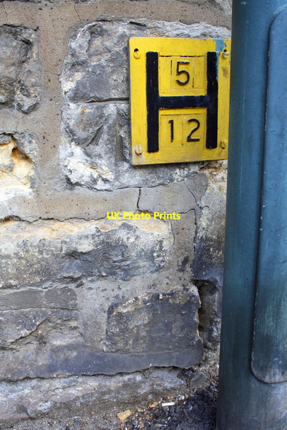 Photo 6"x4" Benchmark and hydrant sign on Toll Tower Moreton-in-Marsh c2015