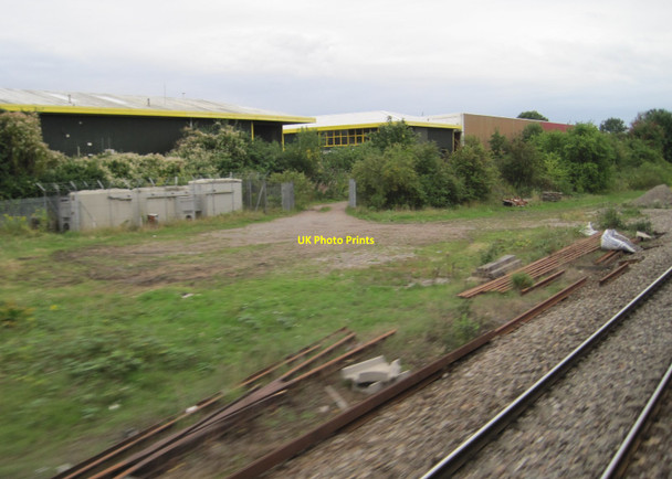 Photo 6"x4" View from a Cheltenham-Birmingham train - industrial buildings in Cheltenham Cheltenham c2015