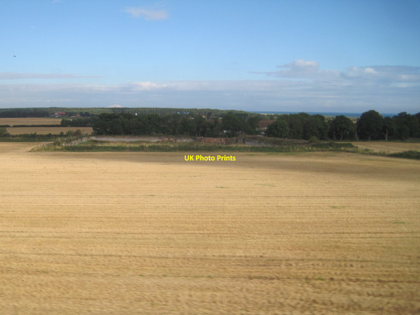 Photo 6"x4" View from a Newcastle-Edinburgh train - fishery near West Barns Dunbar c2015
