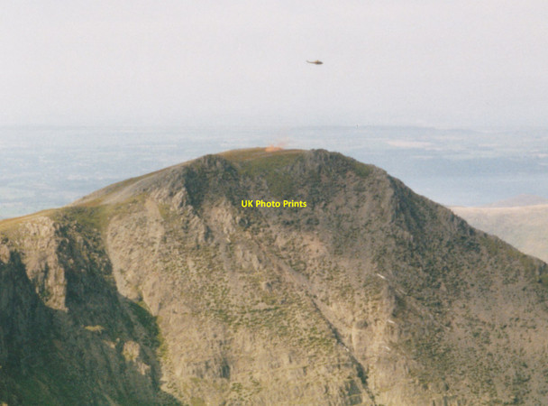 Photo 6"x4" A Griffin helicopter from RAF Valley dropping a flare on the summit of Yr Elen Yr Elen c2000