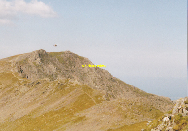 Photo 6"x4" A SARTU helicopter above the summit of Yr Elen Yr Elen c2000