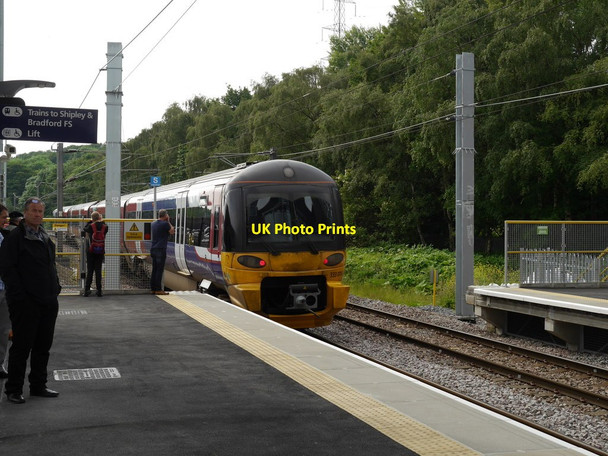 Photo 6"x4" The first Leeds-bound train leaves Kirkstall Forge Station Horsforth c2016
