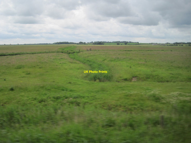 Photo 6"x4" View from a Norwich-Great Yarmouth train - drainage ditches on Tunstall Marshes Stokesby c2016