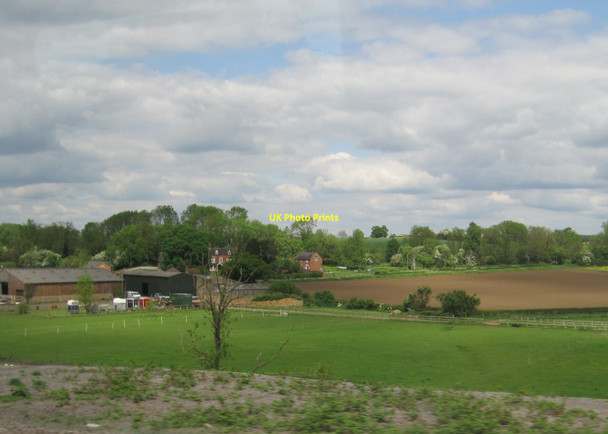 Photo 6"x4" View from a Rugby-Crewe train - farm buildings and fields around Hopsford Hall Hopsford c2016