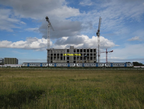 Photo 6"x4" Train and new build south of Addenbrooke's Trumpington c2017