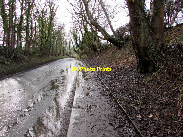 Photo 6"x4" Wet and muddy pavement alongside the A5104 west of Penyffordd, Flintshire Penyffordd c2018